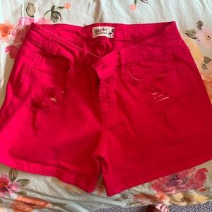 Hot pink shorts with rips